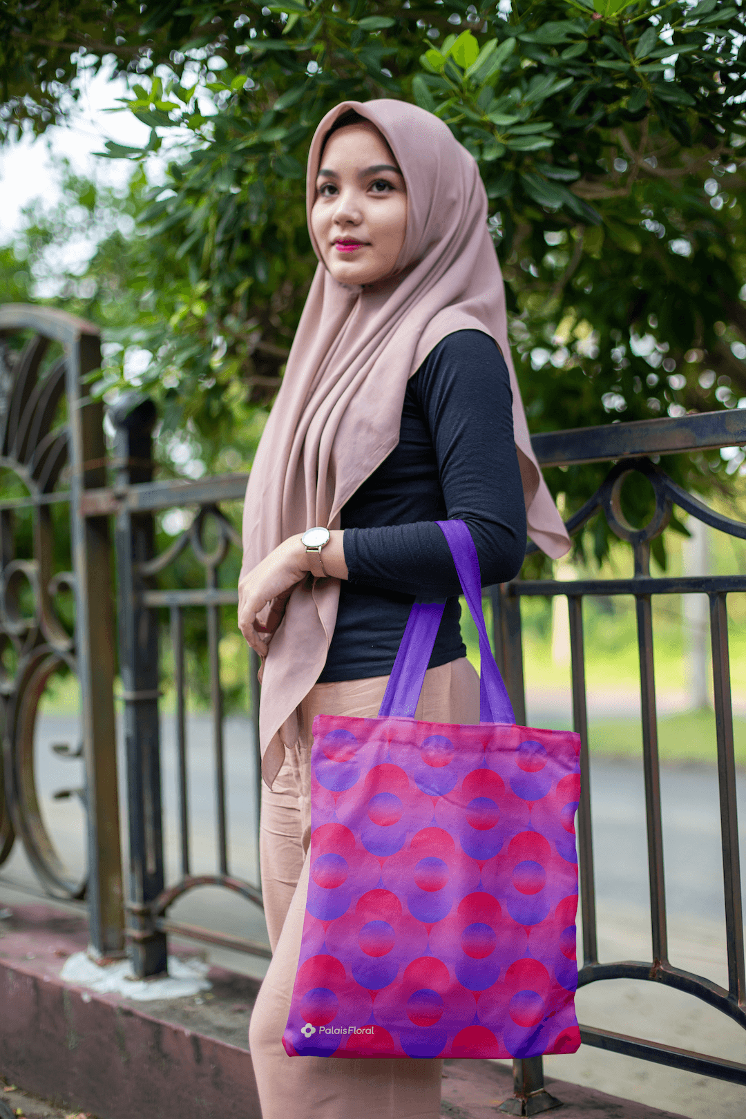 A mockup of a tote bag with an identity pattern on it.